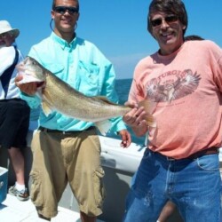 man with fish catch