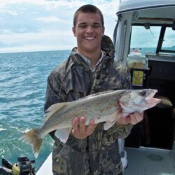 man with fish catch