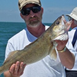 man with fish catch