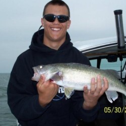 man with fish catch