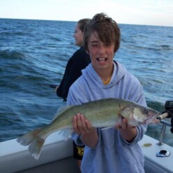 man with fish catch