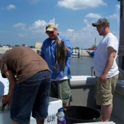 man with fish catch