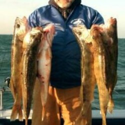 man with fish catch