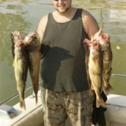 man with fish catch