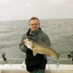 man with fish catch