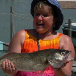 lady fisher with catch