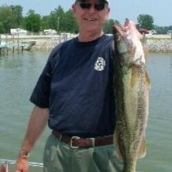 man with fish catch