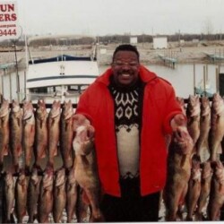 man with fish catch