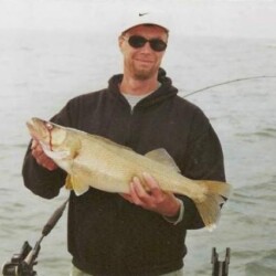 man with fish catch