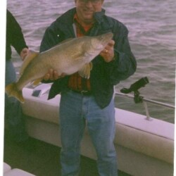 man with fish catch