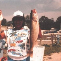 man with fish catch