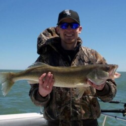 man with fish catch