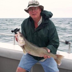 man with fish catch